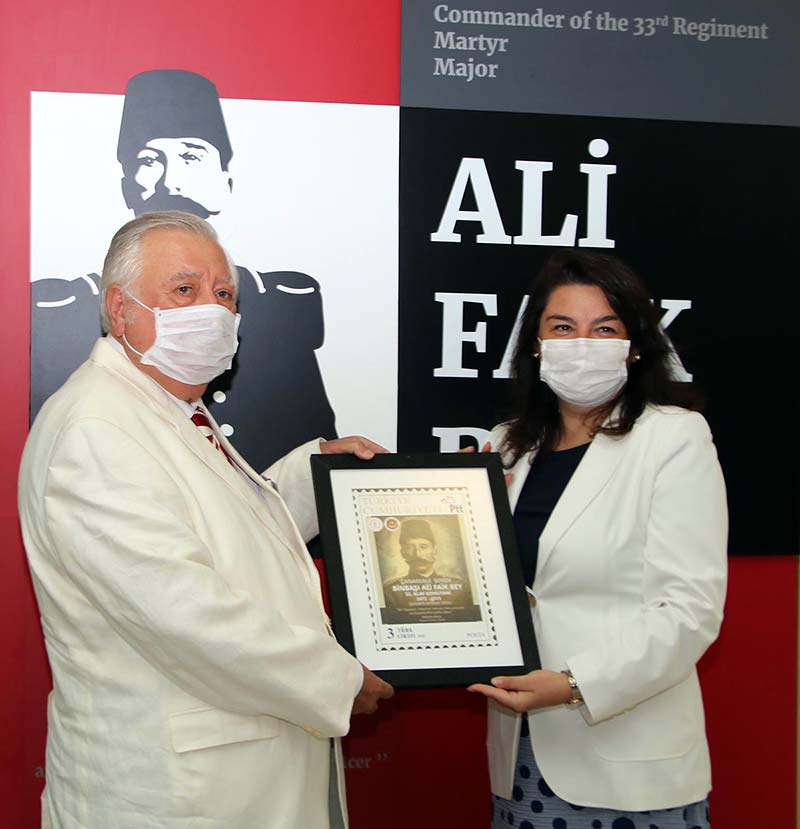 Jülide İskenderoğlu, MP of the Justice and Development Party from Çanakkale is presenting the PTT Major Ali Faik Bey special stamp
